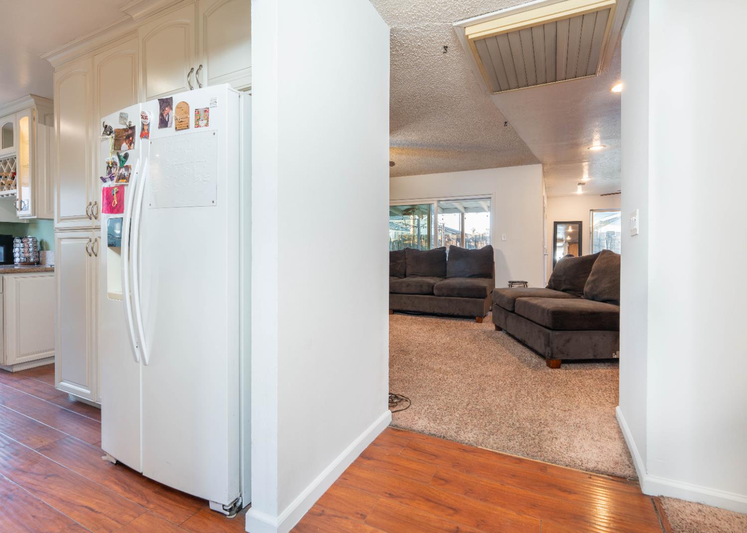 1574 Bluejay Circle Hanford, CA 93230 - Photo 3 of 23 a living room with furniture and a couch