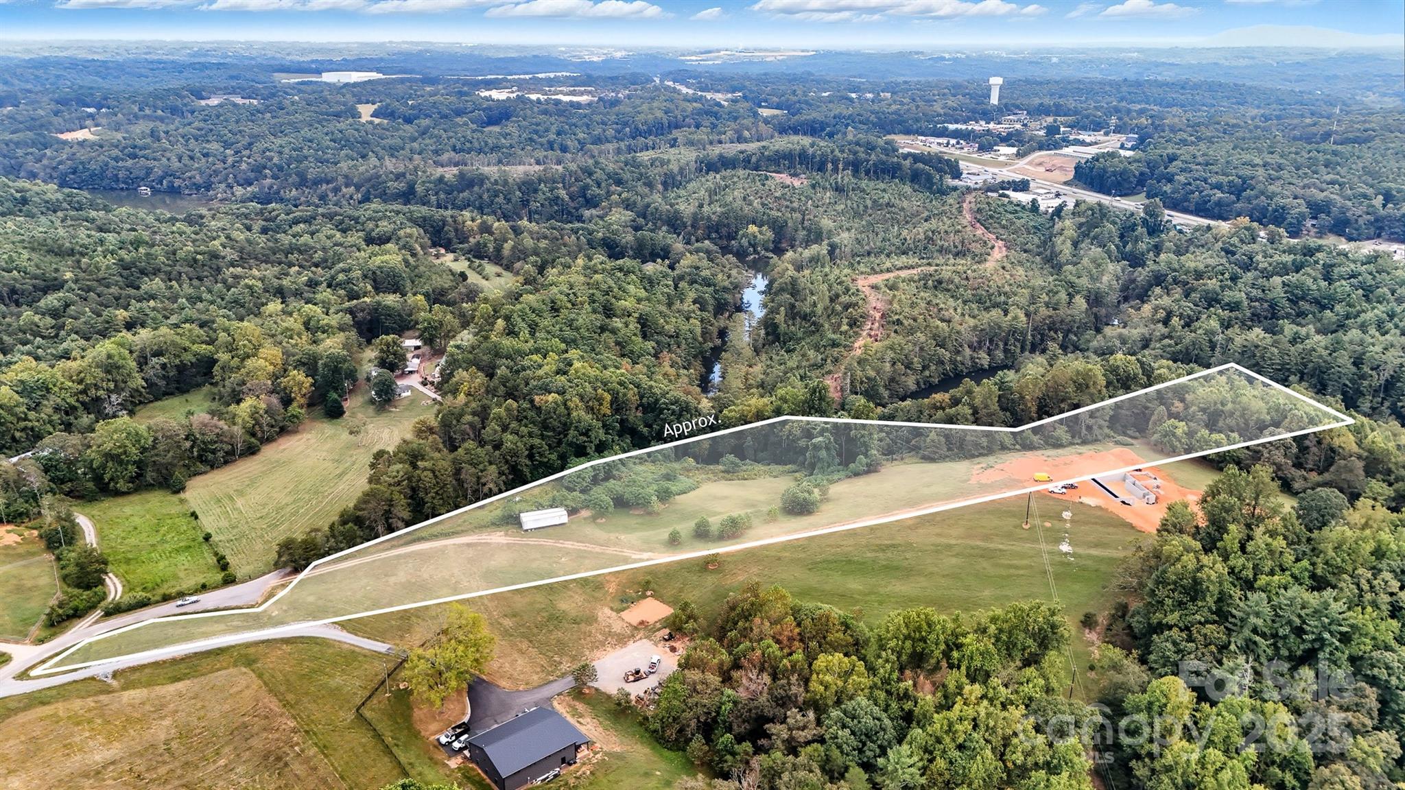 0 Myers Road Granite Falls, NC 28630 - Photo 9 of 14 an aerial view of residential houses with outdoor space and trees