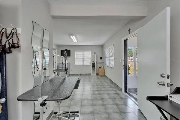 a bathroom with a sink a toilet and shower curtain