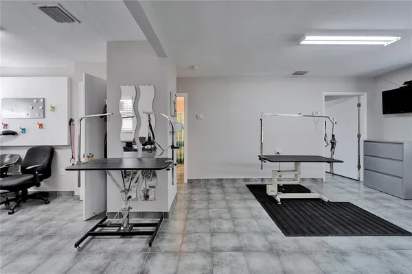 a kitchen with stainless steel appliances granite countertop a sink stove microwave and cabinets