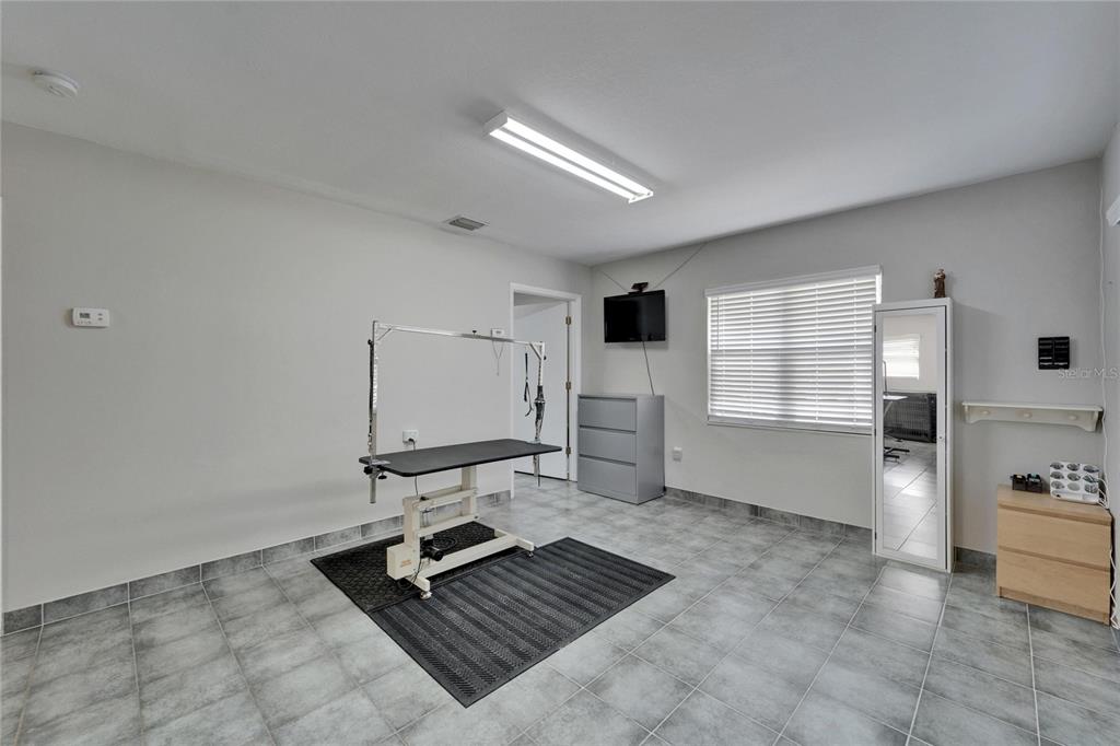 126 Ridgewood Avenue Brandon, FL 33510 - Photo 24 of 85 a living room with furniture a air conditioner vent and a window