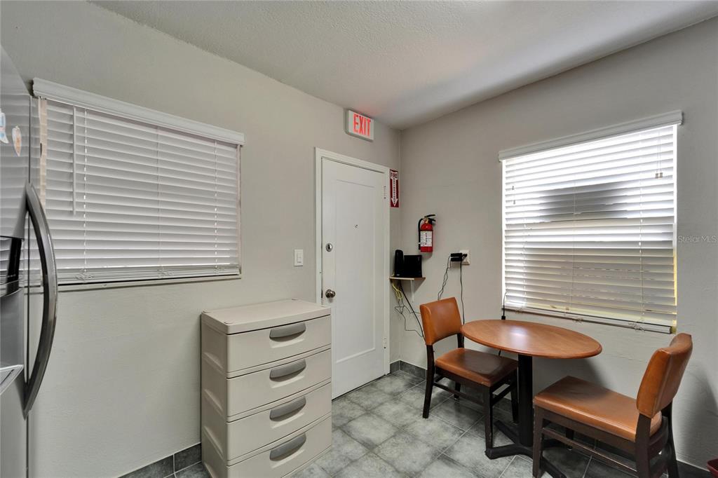 126 Ridgewood Avenue Brandon, FL 33510 - Photo 32 of 85 a view of a workspace with furniture and a window