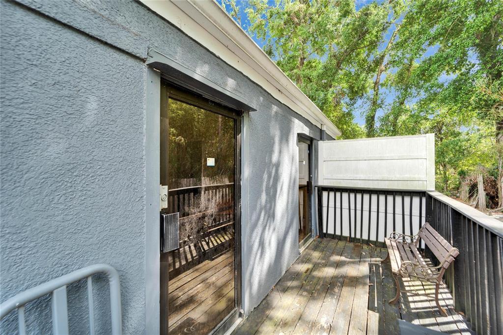 126 Ridgewood Avenue Brandon, FL 33510 - Photo 44 of 85 a view of balcony with wooden floor and fence