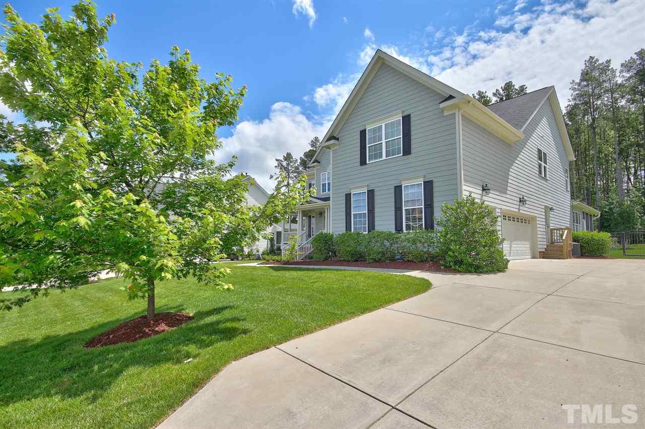 209 Bridle Boast Road Cary, NC 27519 - Photo 2 of 25 a front view of a house with a yard