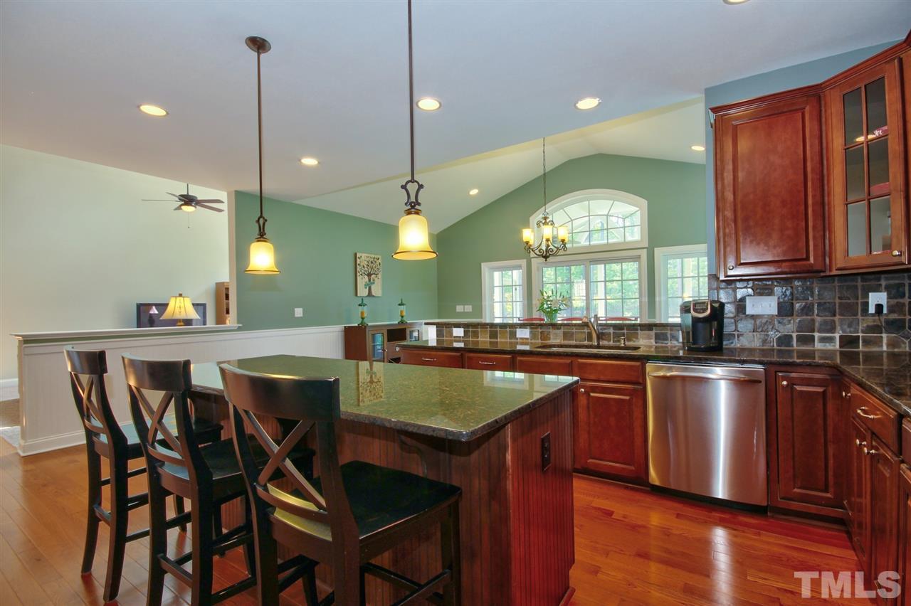 209 Bridle Boast Road Cary, NC 27519 - Photo 12 of 25 a kitchen with lots of counter space sink and appliances