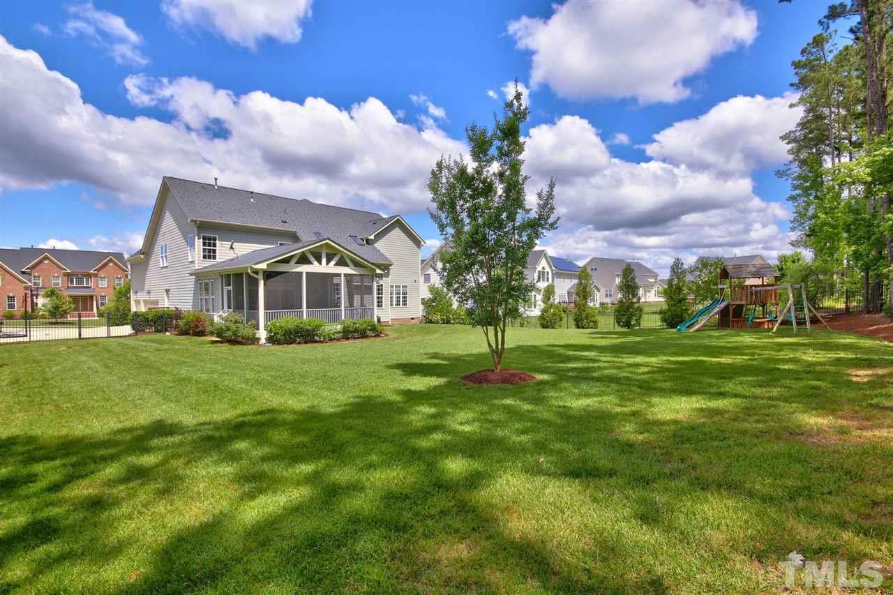 209 Bridle Boast Road Cary, NC 27519 - Photo 25 of 25 a view of a house with a big yard