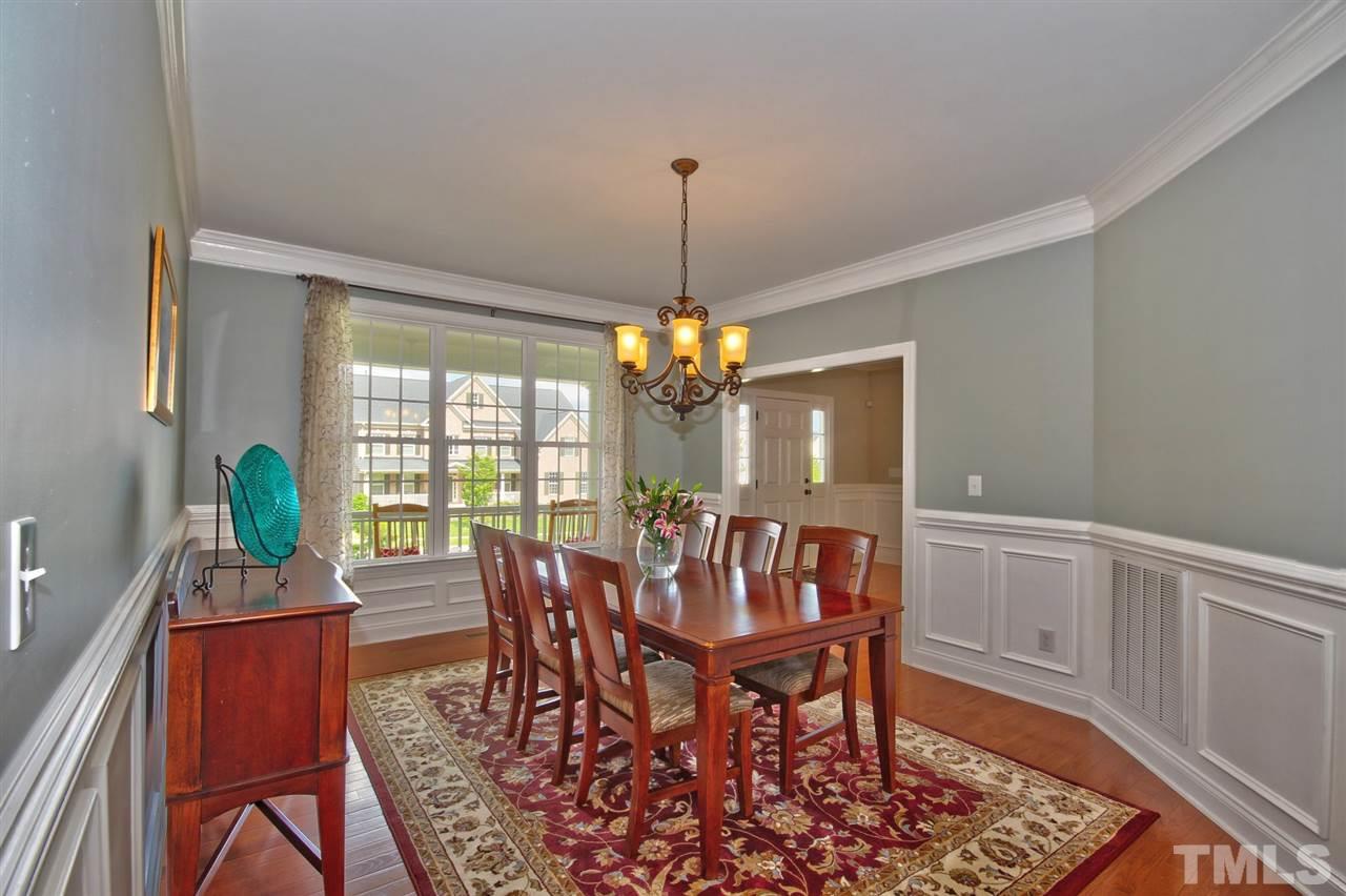 209 Bridle Boast Road Cary, NC 27519 - Photo 5 of 25 a view of a dining room with furniture window and wooden floor