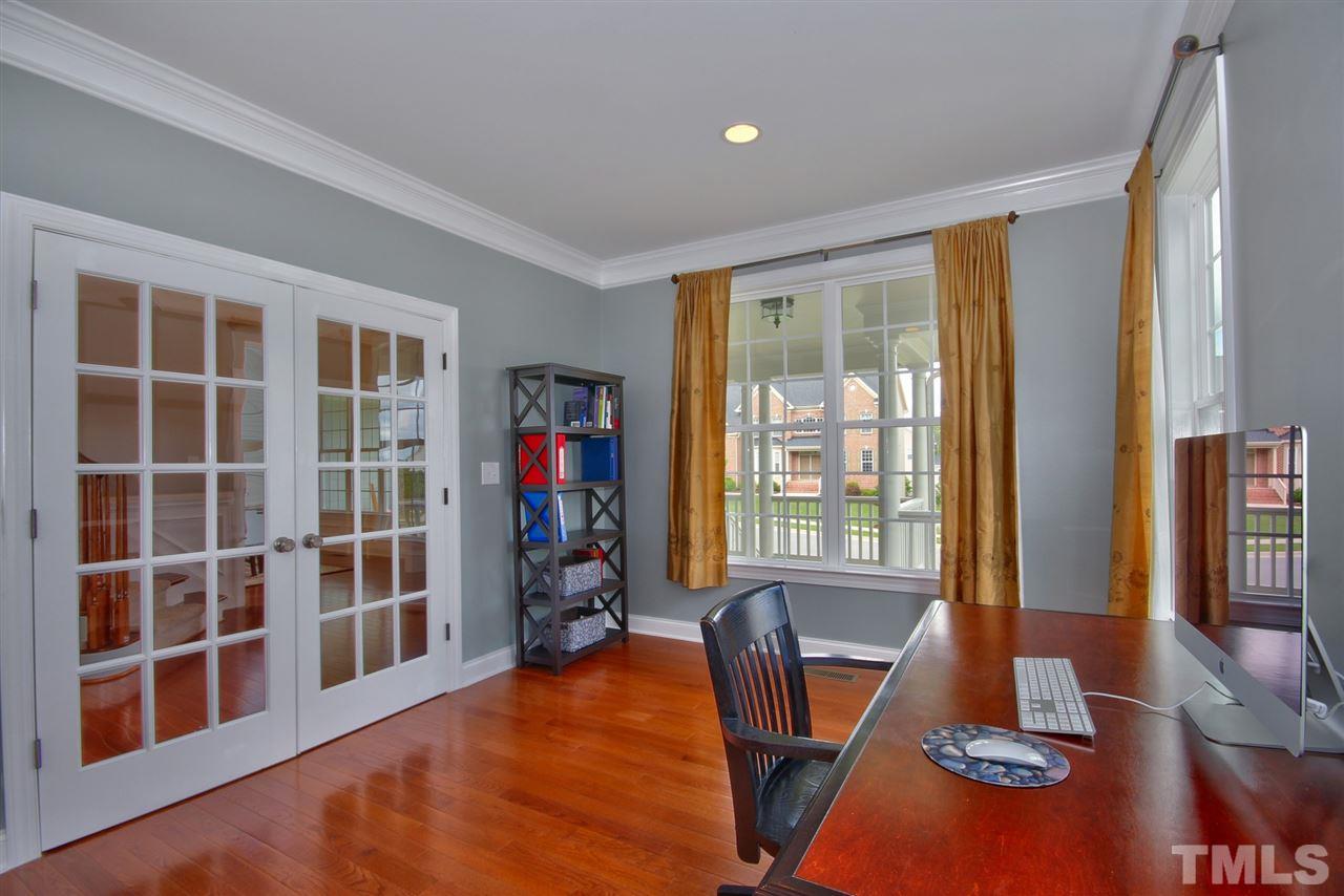 209 Bridle Boast Road Cary, NC 27519 - Photo 6 of 25 a view of a livingroom with furniture and wooden floor