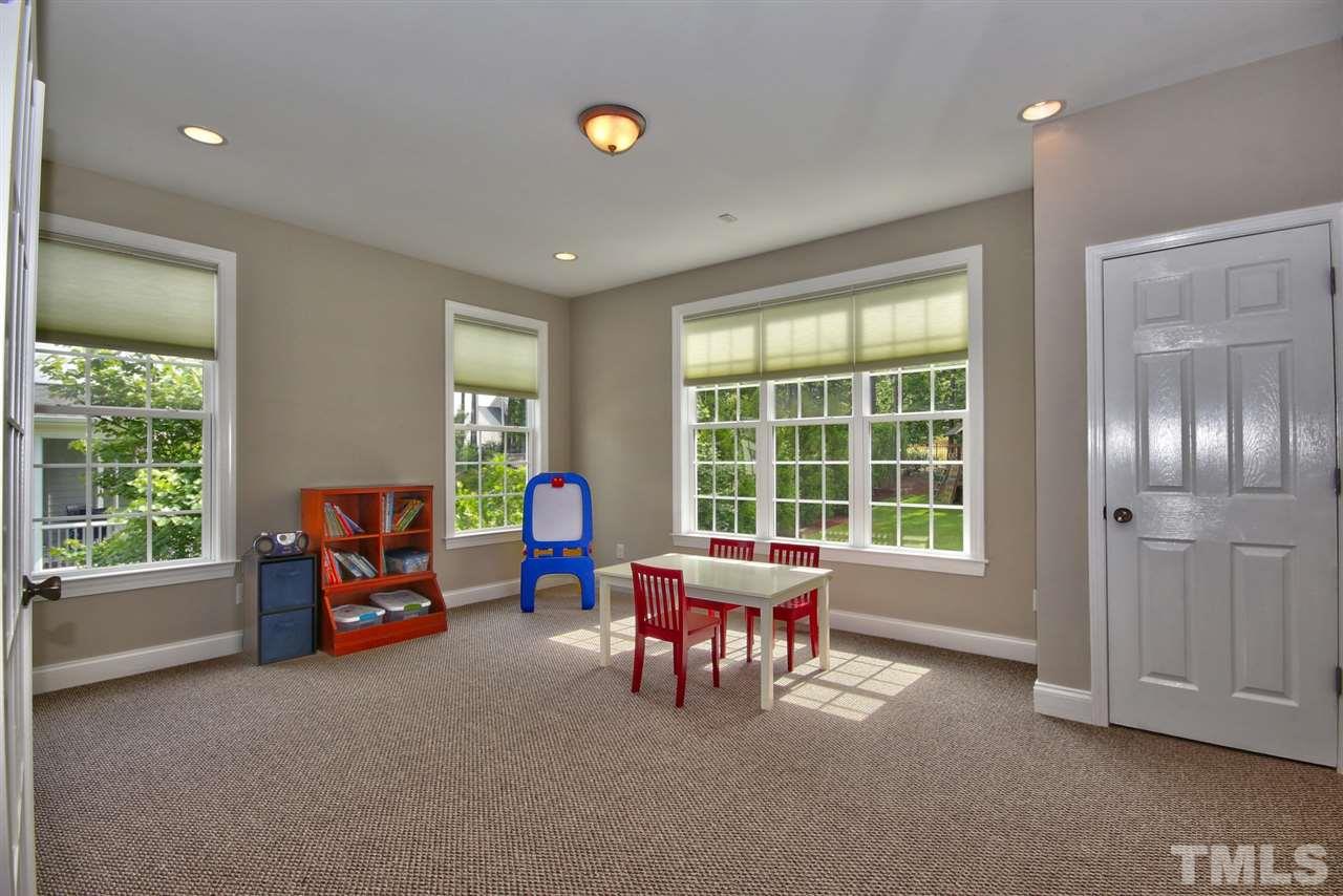 209 Bridle Boast Road Cary, NC 27519 - Photo 7 of 25 a living room with furniture and a window