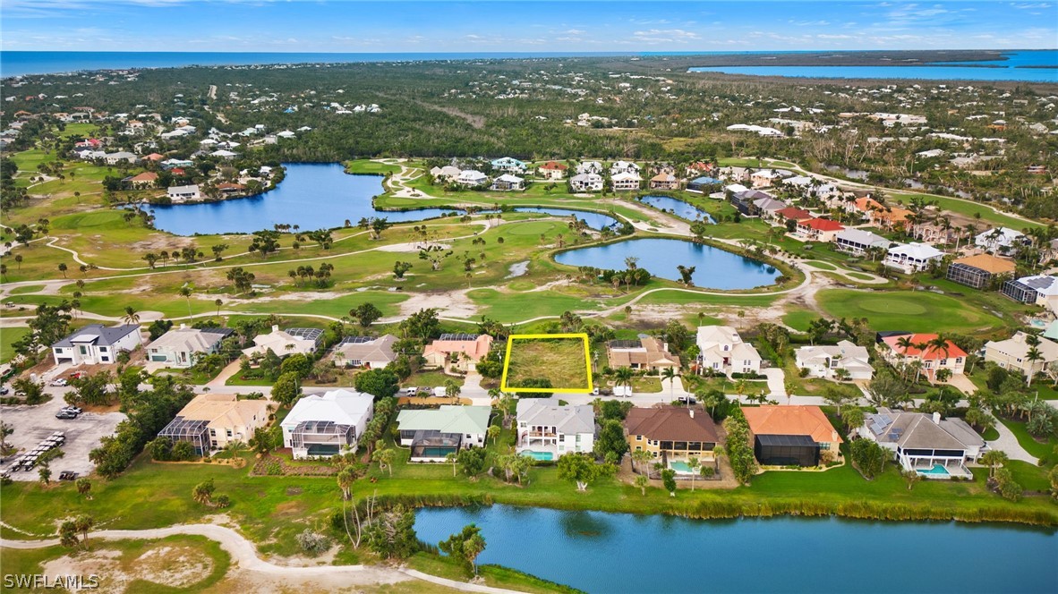 717 Birdie View Point Sanibel, FL 33957 - Photo 18 of 20 an aerial view of residential houses with outdoor space