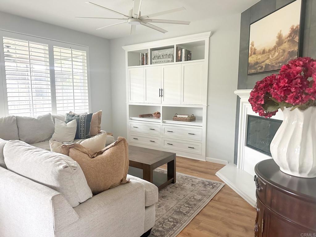 29824 Talitha Way Murrieta, CA 92563 - Photo 11 of 27 a living room with furniture and a flat screen tv