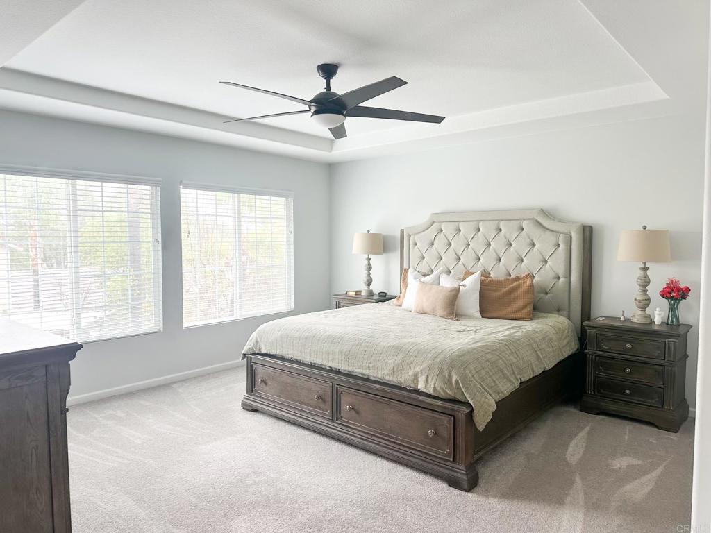 29824 Talitha Way Murrieta, CA 92563 - Photo 15 of 27 a spacious bedroom with a bed and window