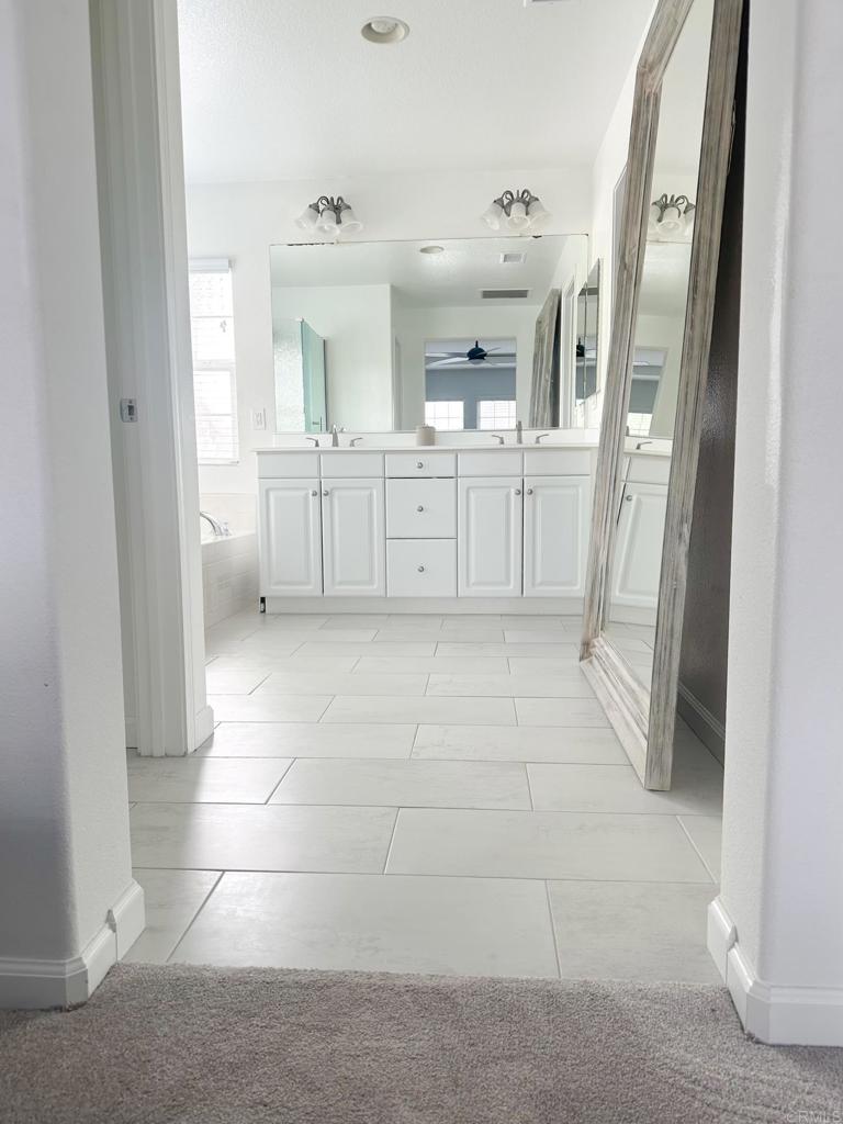 29824 Talitha Way Murrieta, CA 92563 - Photo 17 of 27 a view of a kitchen with a sink