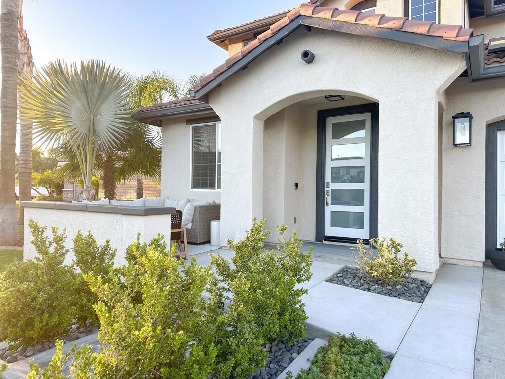 29824 Talitha Way Murrieta, CA 92563 - Photo 2 of 27 a front view of a house with a yard