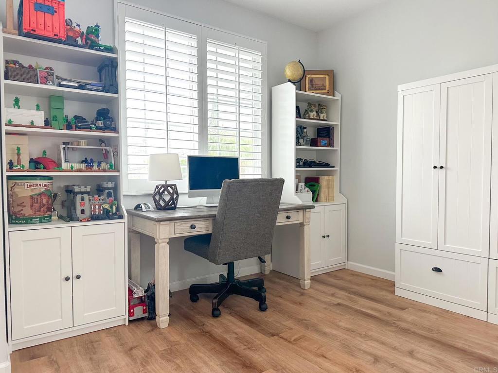 29824 Talitha Way Murrieta, CA 92563 - Photo 6 of 27 a view of a workspace with furniture and a window