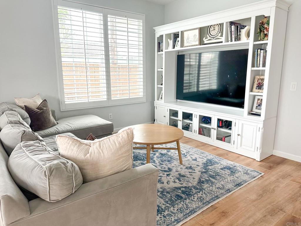 29824 Talitha Way Murrieta, CA 92563 - Photo 7 of 27 a living room with furniture and a flat screen tv
