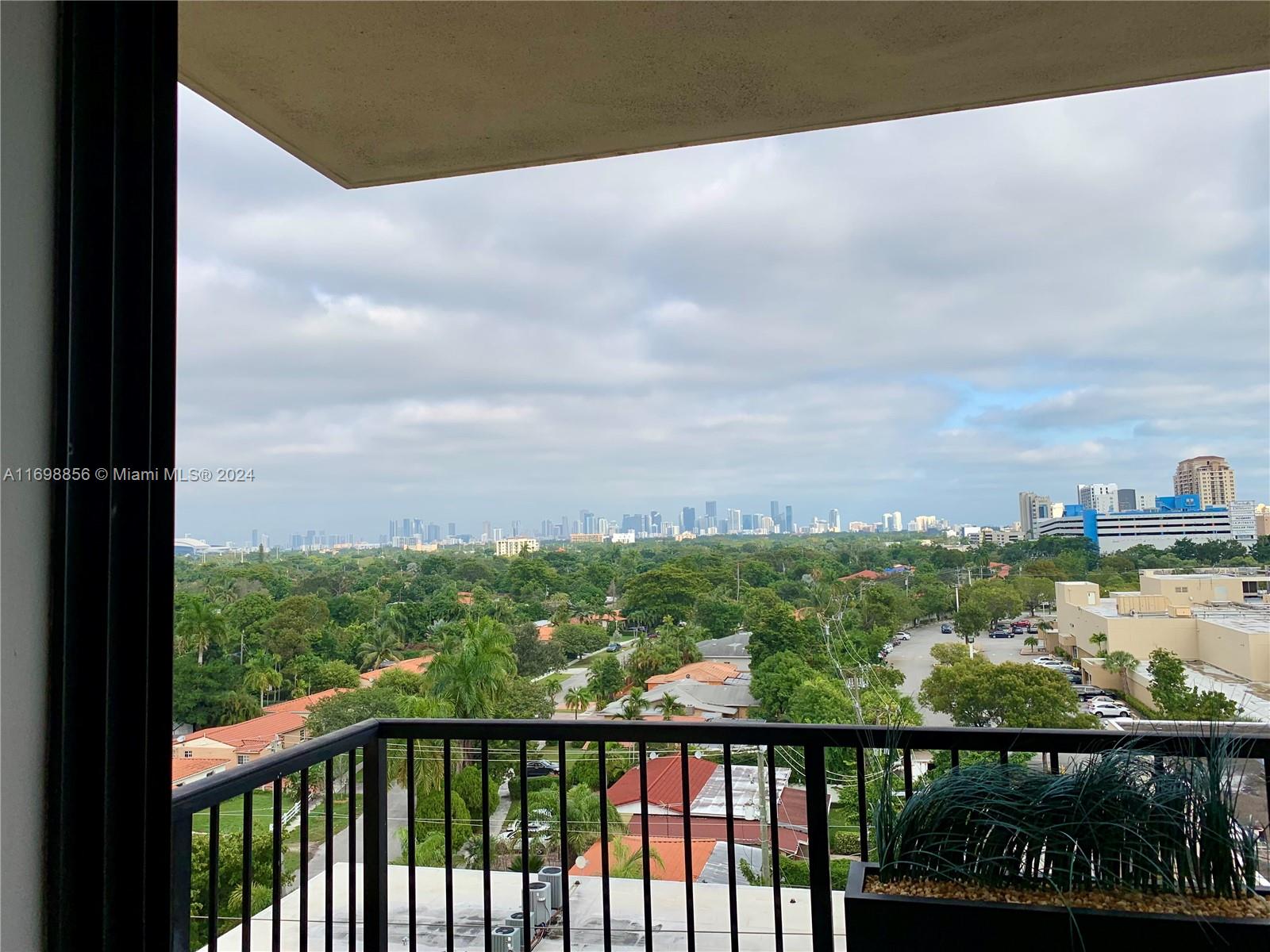 55 Merrick Way, Unit 730 Coral Gables, FL 33134 - Photo 23 of 23 a city view from a balcony