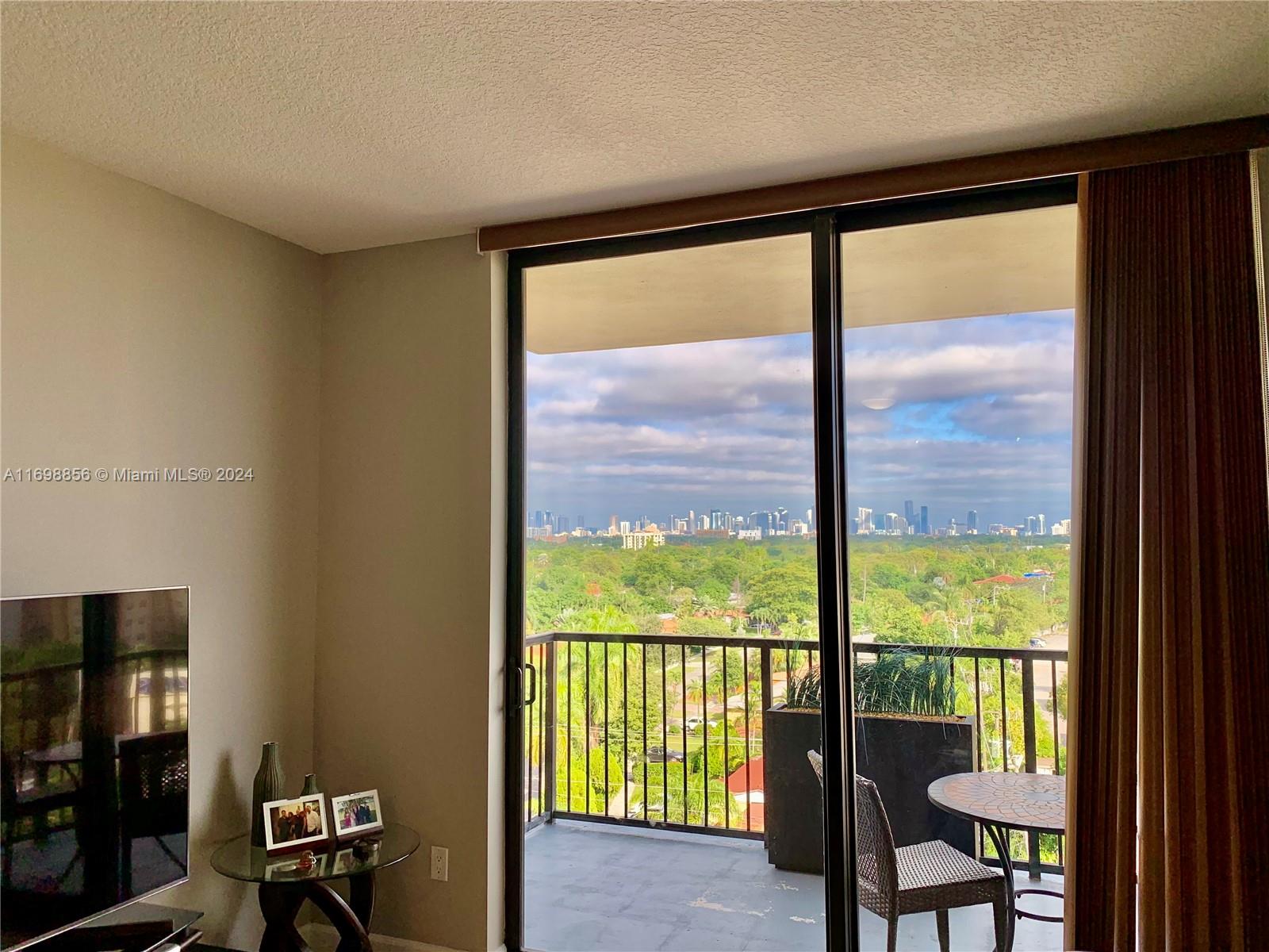 55 Merrick Way, Unit 730 Coral Gables, FL 33134 - Photo 5 of 23 a view of a room with a large window