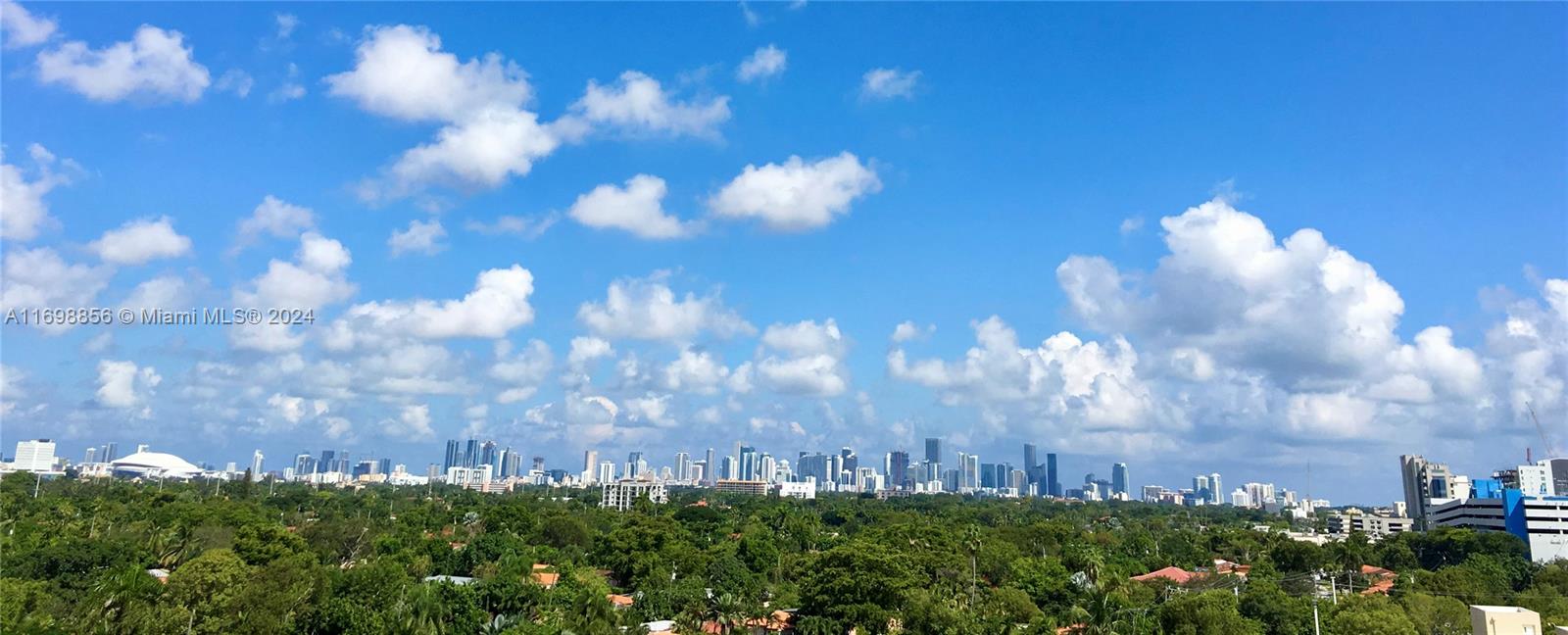 55 Merrick Way, Unit 730 Coral Gables, FL 33134 - Photo 7 of 23 a view of a building in a yard