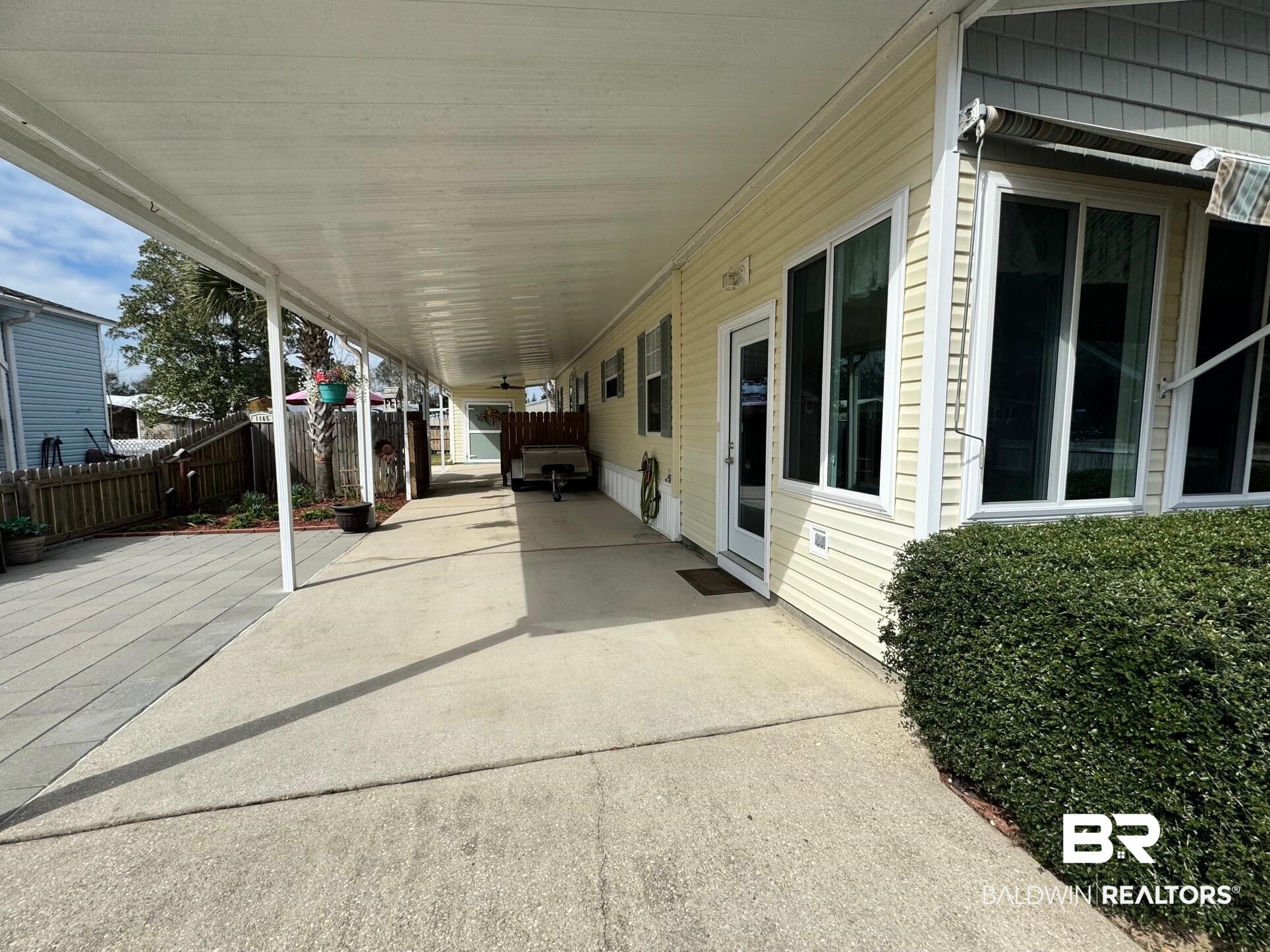 1165 Santa Anna Lane Lillian, AL 36549 - Photo 20 of 43 View of patio / terrace featuring fence