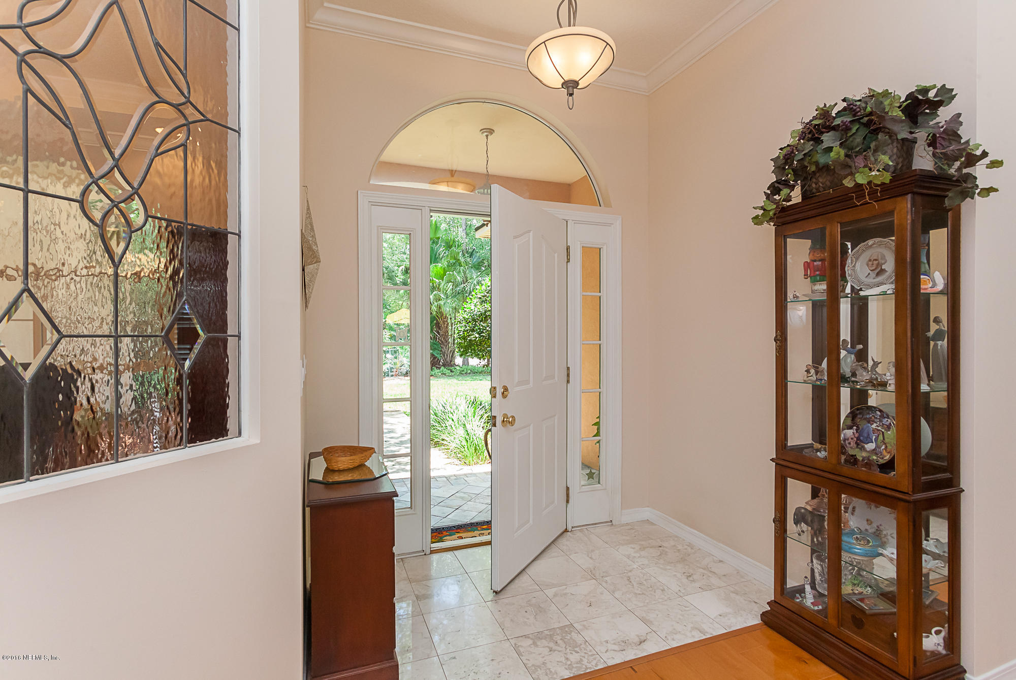 680 Roberts Road St. Johns, FL 32259 - Photo 5 of 45 a front view of a house with garden