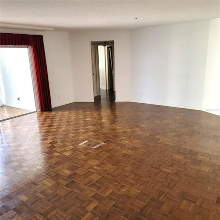 a view of an empty room and window