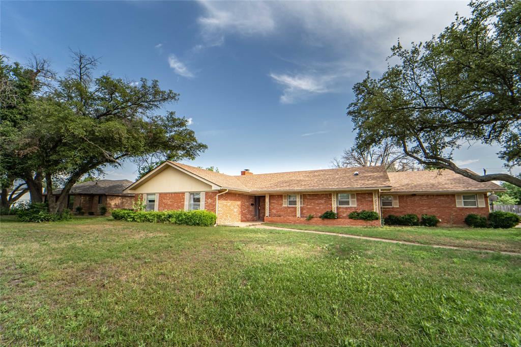 1505 West Sycamore Street Breckenridge, TX 76424 - Photo 1 of 1 a view of house that has a yard