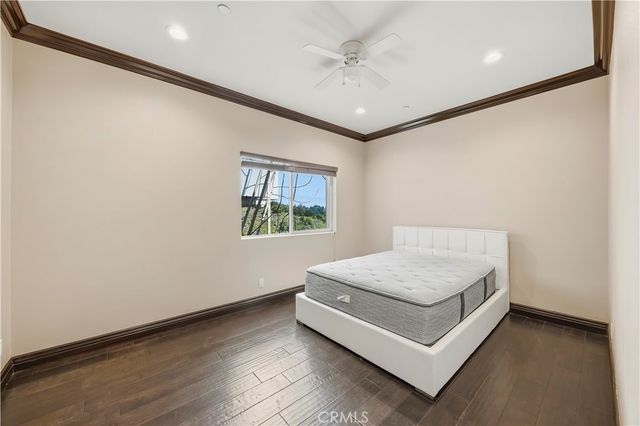 a room with a bed and window