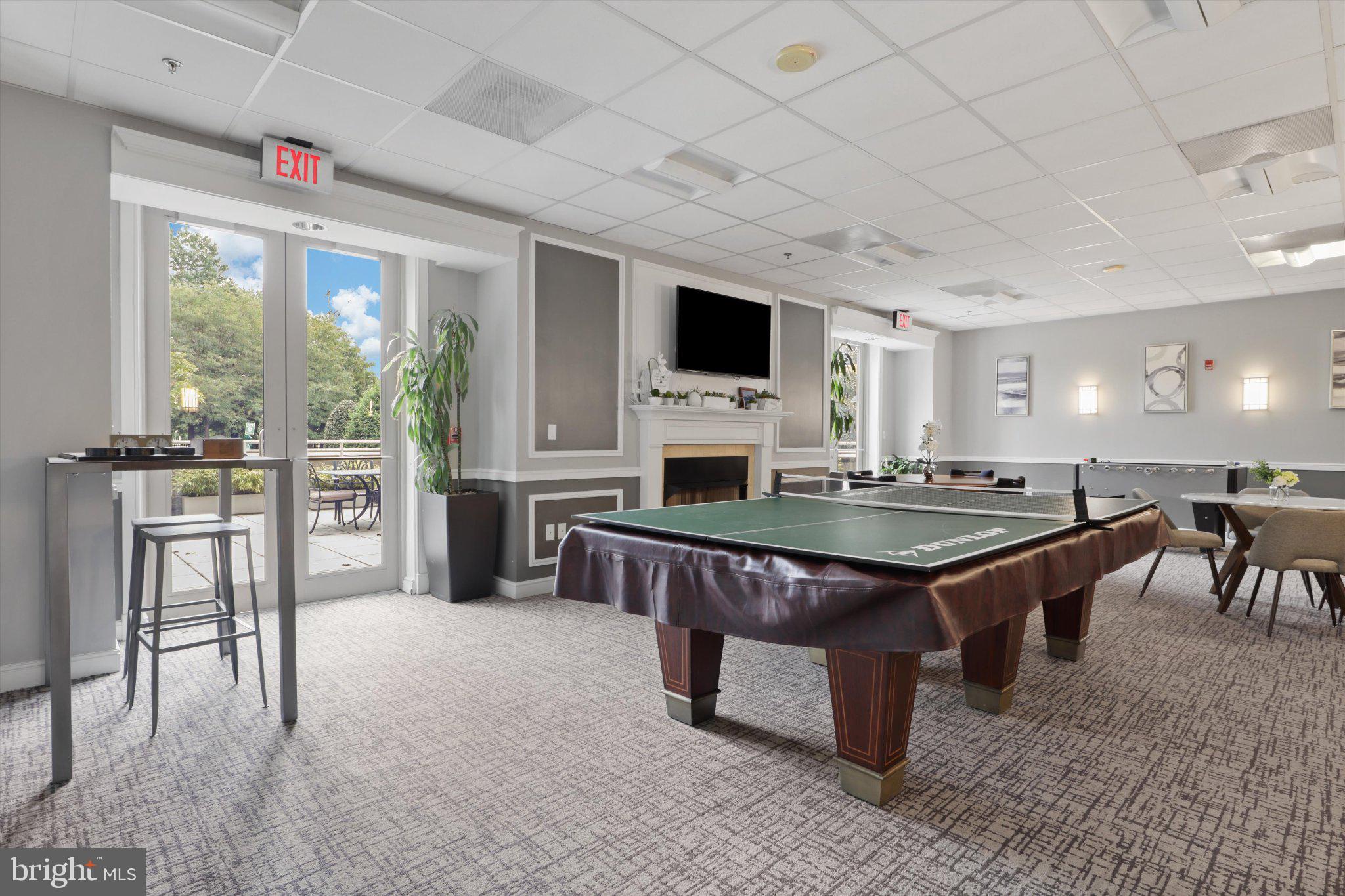 2726 Gallows Road, Unit 1506 Vienna, VA 22180 - Photo 26 of 35 Inviting game room with natural light.