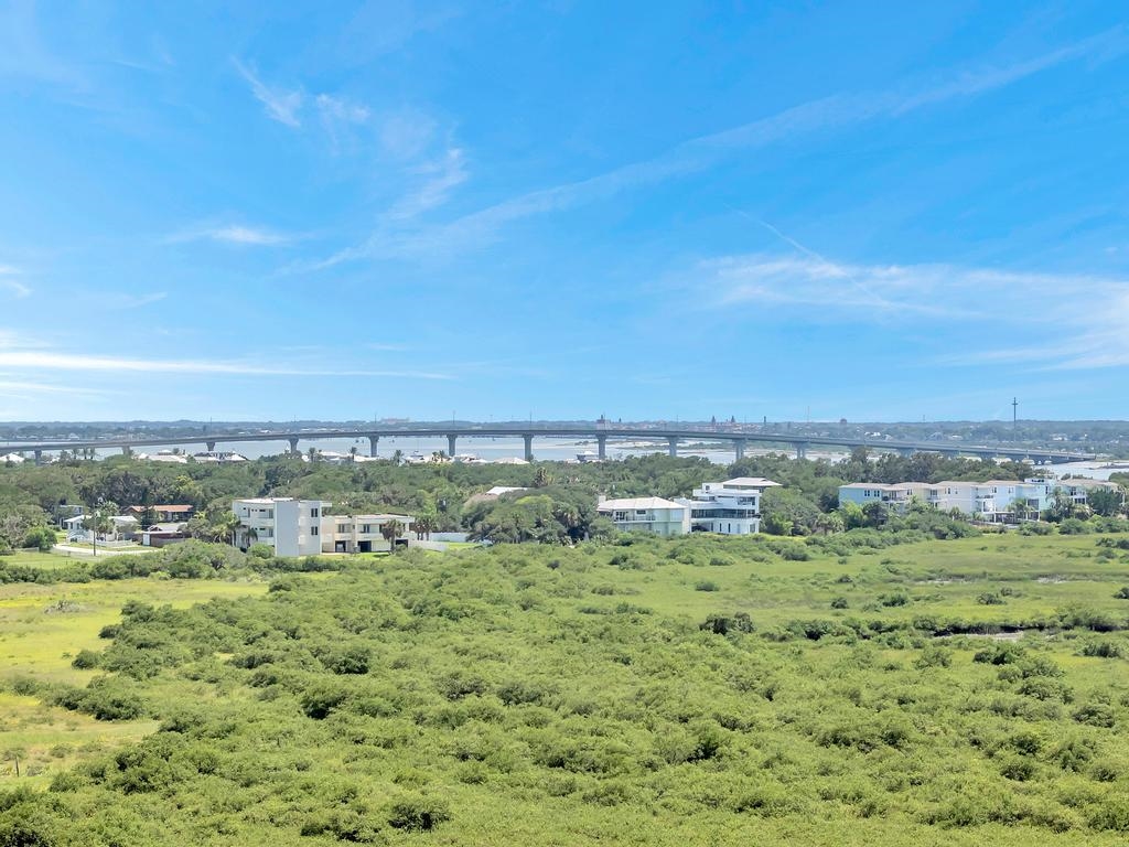 3244 Coastal Highway St. Augustine, FL 32084 - Photo 14 of 15 a view of a green field with lots of trees in it