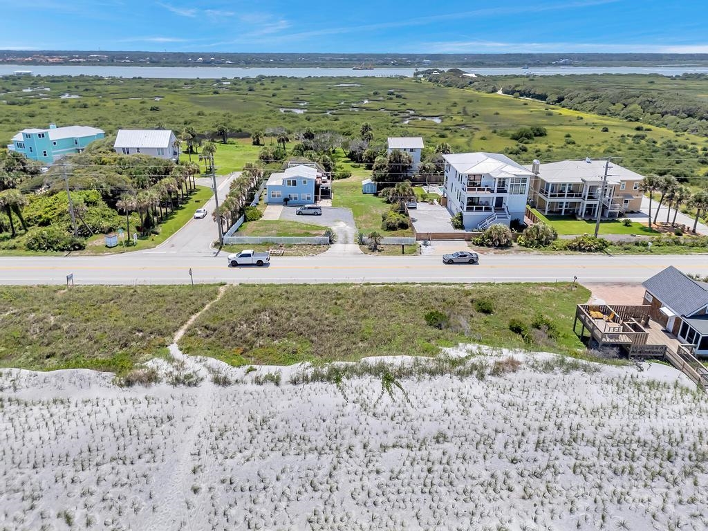 3244 Coastal Highway St. Augustine, FL 32084 - Photo 3 of 15 an aerial view of residential houses with outdoor space