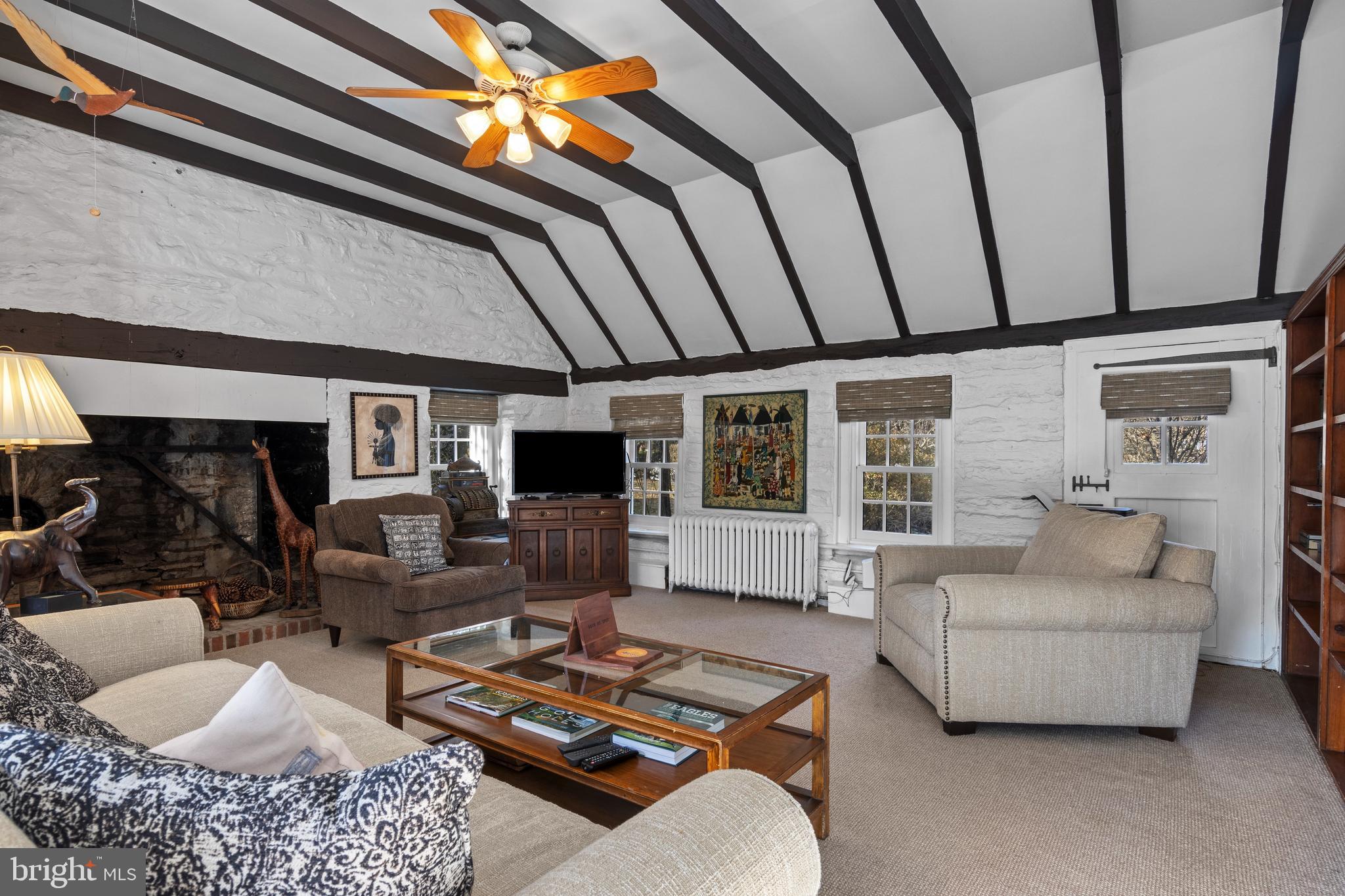345 Llandrillo Road Bala Cynwyd, PA 19004 - Photo 11 of 54 a living room with furniture and a flat screen tv