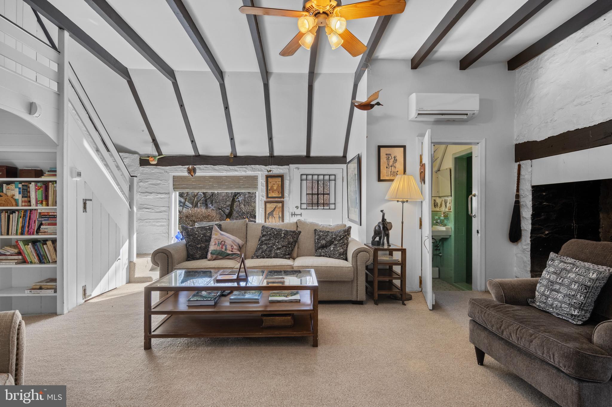 345 Llandrillo Road Bala Cynwyd, PA 19004 - Photo 13 of 54 a living room with furniture and a fireplace