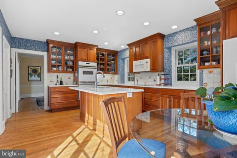 a bedroom with a bed and a fireplace