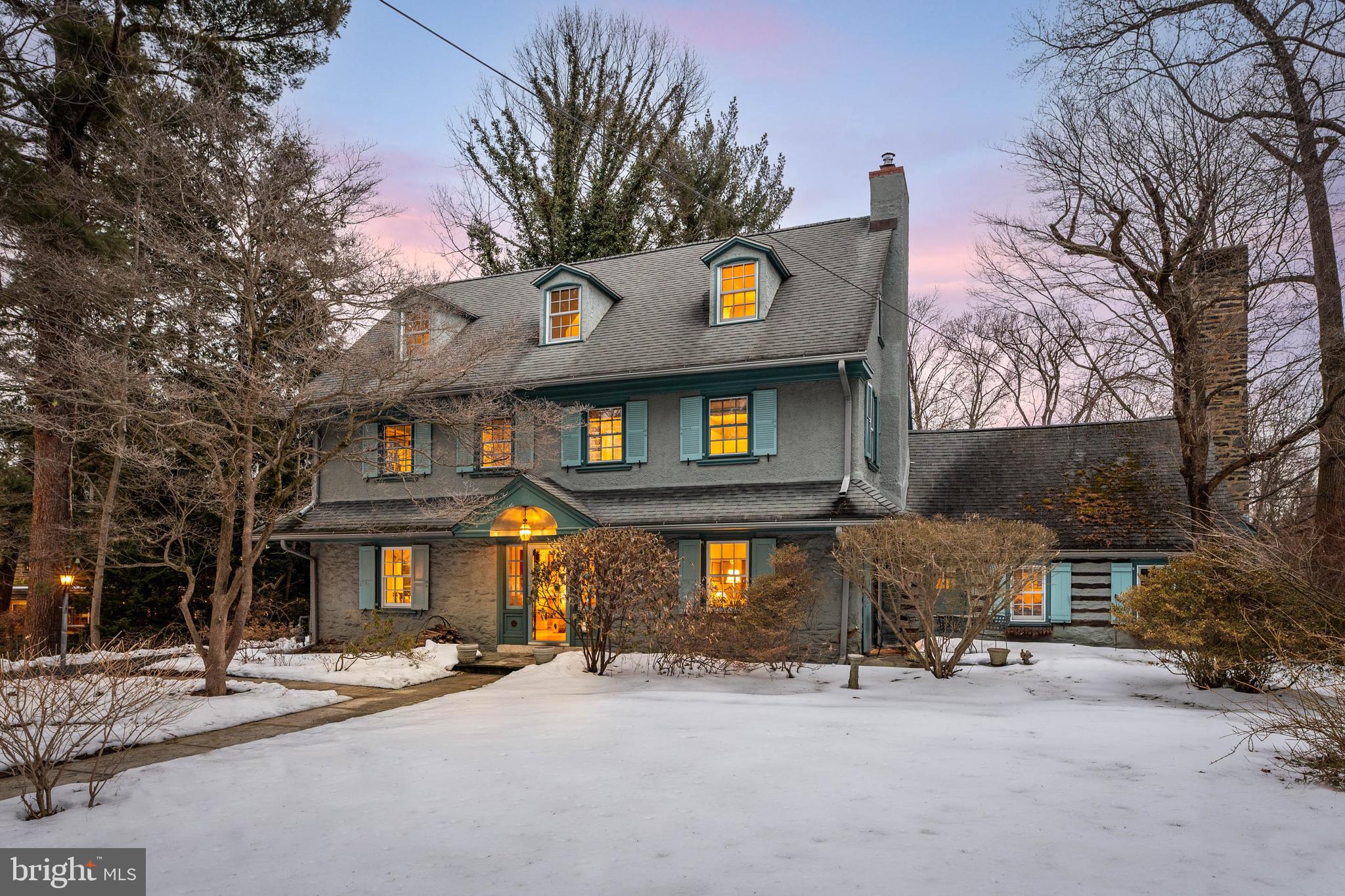 345 Llandrillo Road Bala Cynwyd, PA 19004 - Photo 3 of 54 a view of a cafe with table and chairs under an umbrella