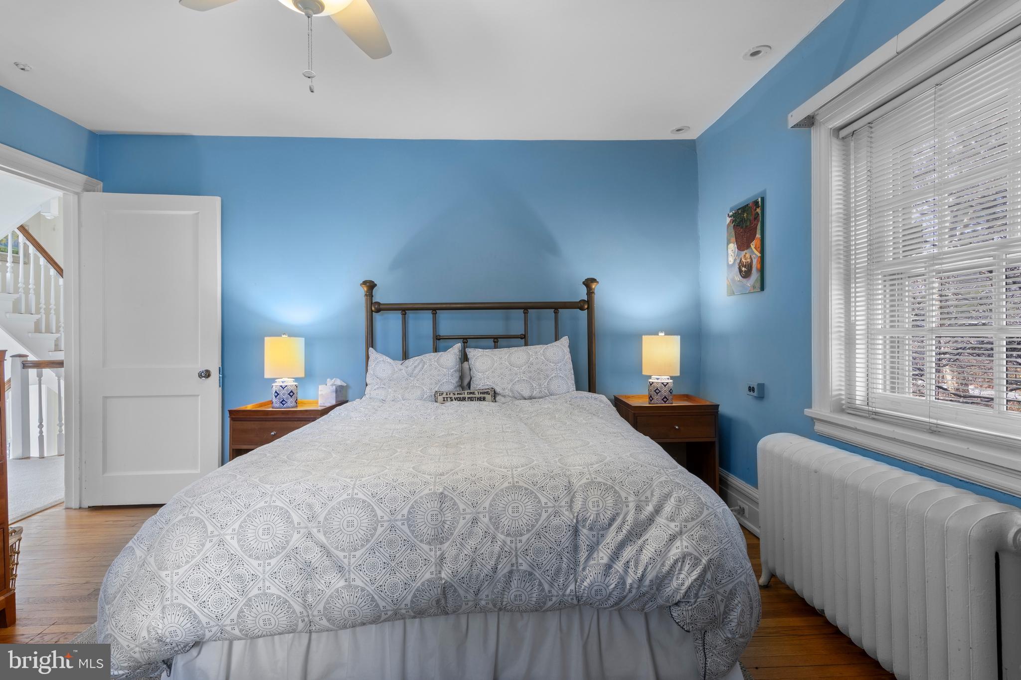 345 Llandrillo Road Bala Cynwyd, PA 19004 - Photo 37 of 54 a bedroom with a bed and a lamp