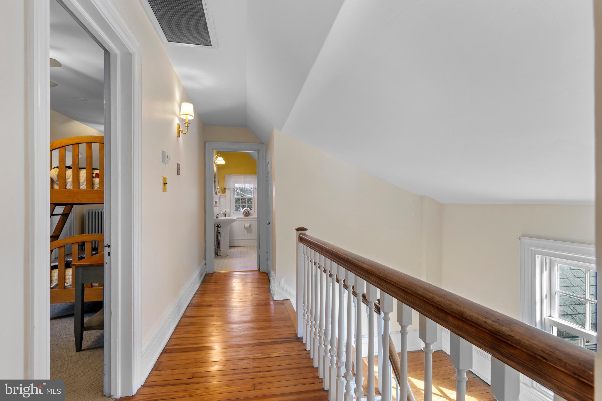 345 Llandrillo Road Bala Cynwyd, PA 19004 - Photo 48 of 54 a view of a hallway with wooden floor and staircase