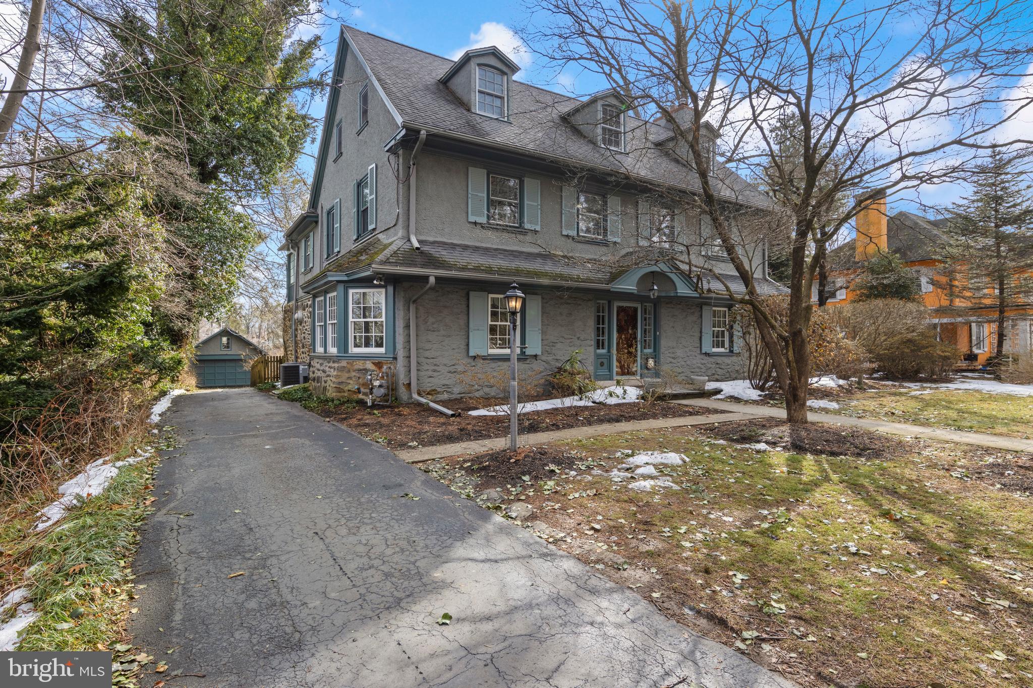 345 Llandrillo Road Bala Cynwyd, PA 19004 - Photo 50 of 54 a view of a house with a yard and large tree