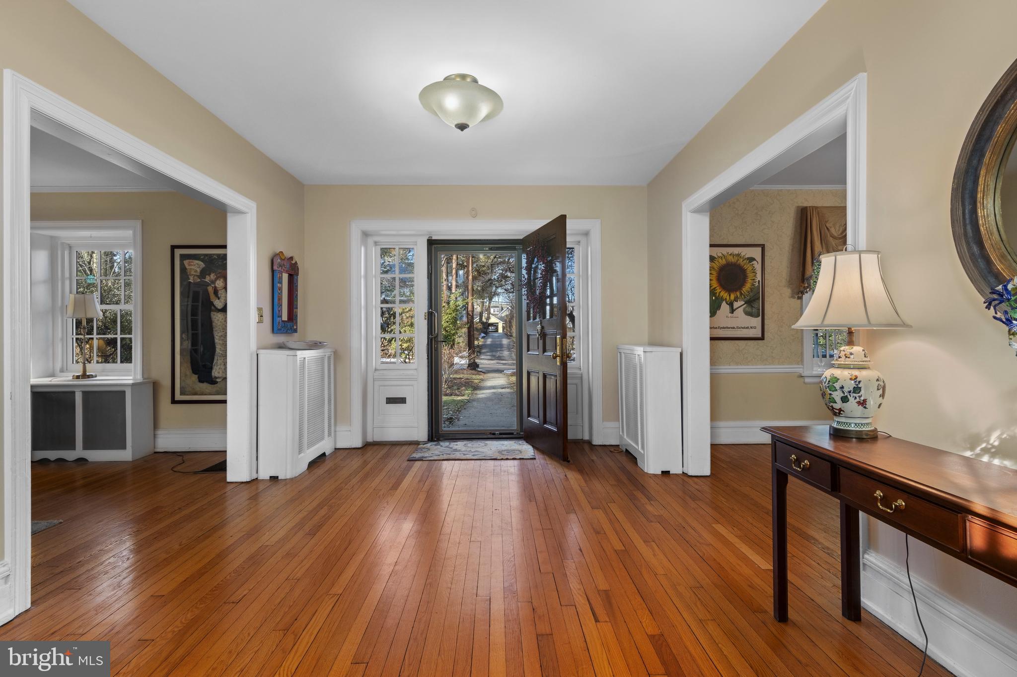 345 Llandrillo Road Bala Cynwyd, PA 19004 - Photo 5 of 54 wooden floor in an empty room with a window
