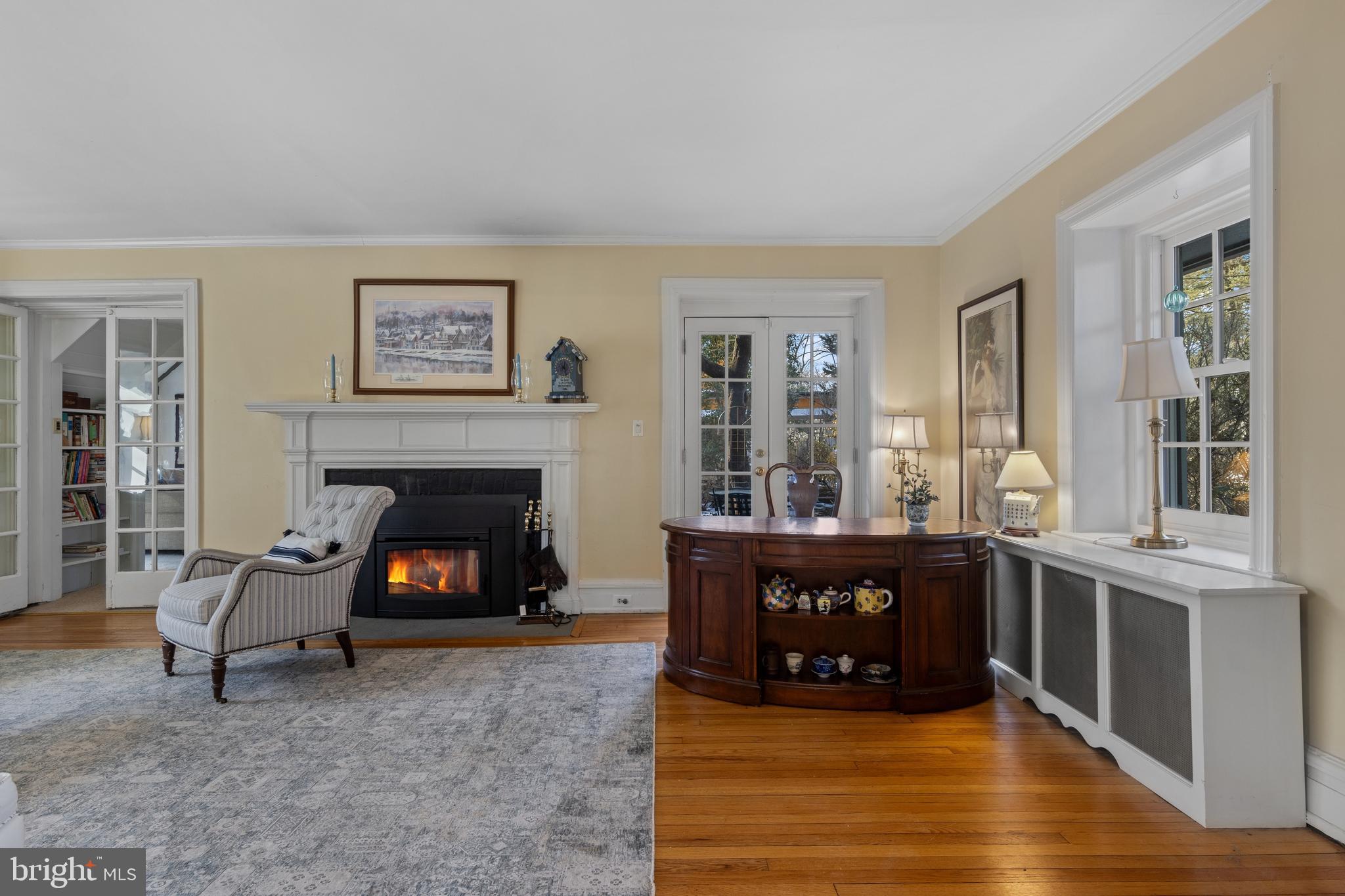 345 Llandrillo Road Bala Cynwyd, PA 19004 - Photo 9 of 54 a living room with furniture and a fireplace