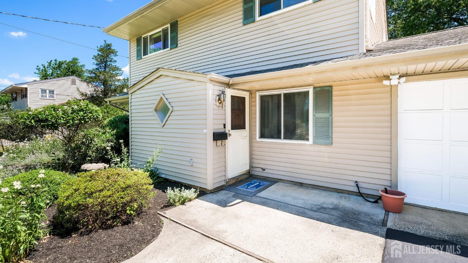 50 Sand Hills Road Kendall Park, NJ 08824 - Photo 27 of 27 a view of a house with a yard