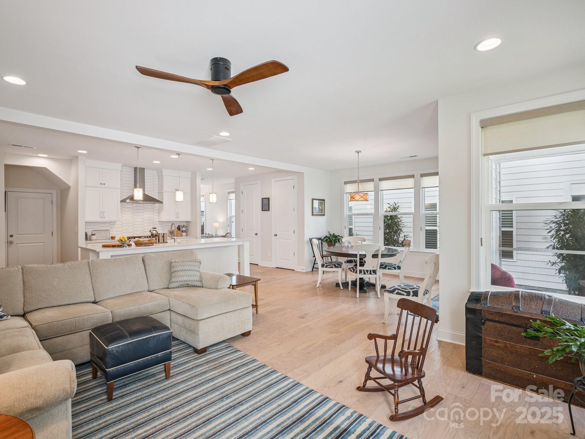 4013 Ashton Ridge Lane Charlotte, NC 28226 - Photo 17 of 36 a living room with furniture and kitchen view