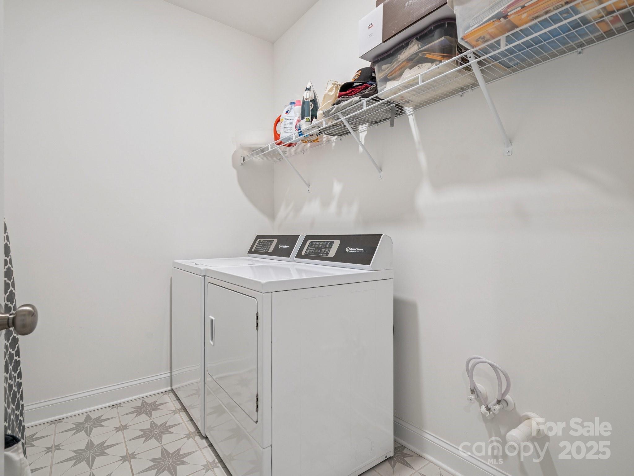 4013 Ashton Ridge Lane Charlotte, NC 28226 - Photo 28 of 36 a utility room with dryer and washer