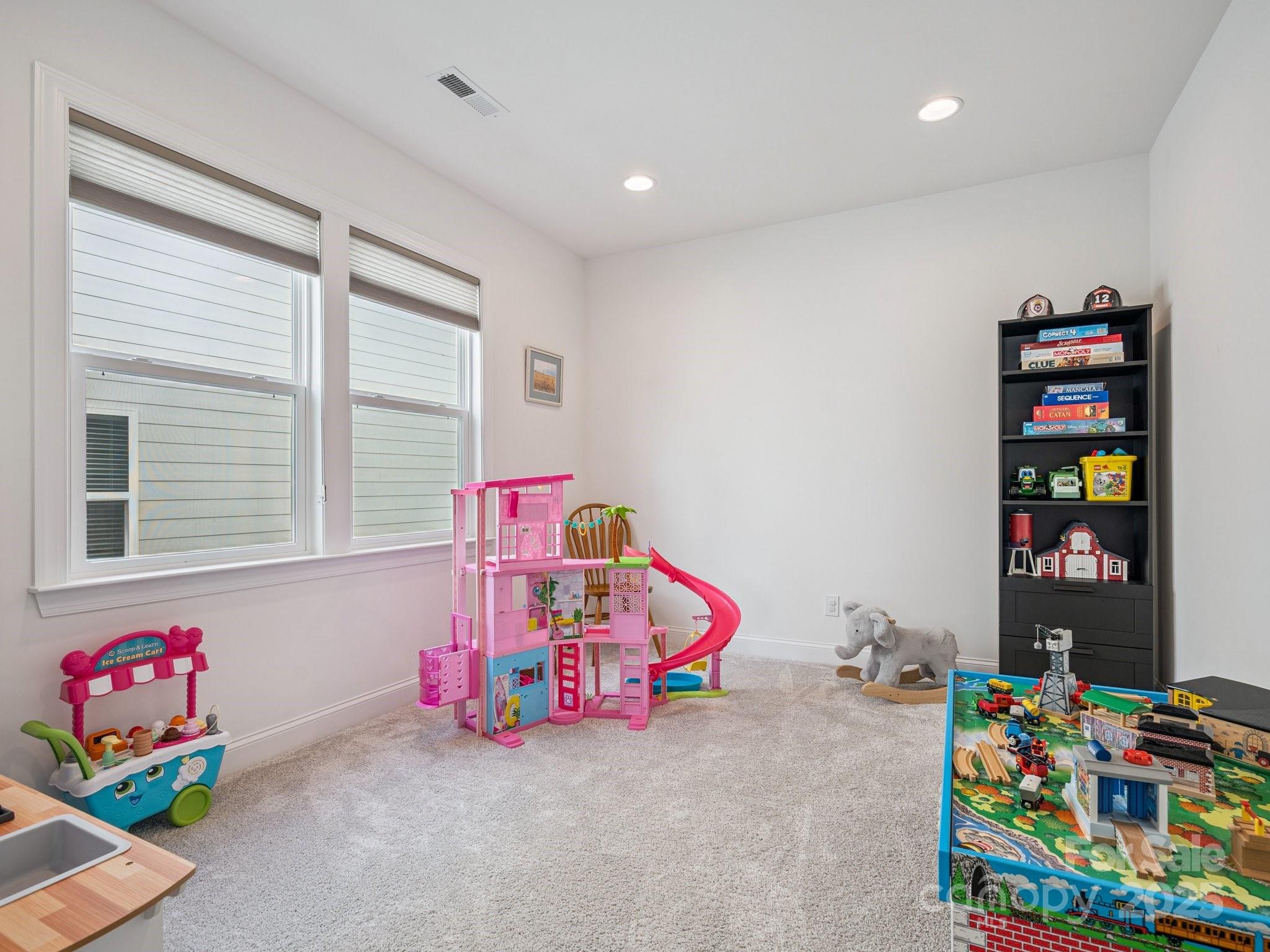 4013 Ashton Ridge Lane Charlotte, NC 28226 - Photo 29 of 36 a play room with toys