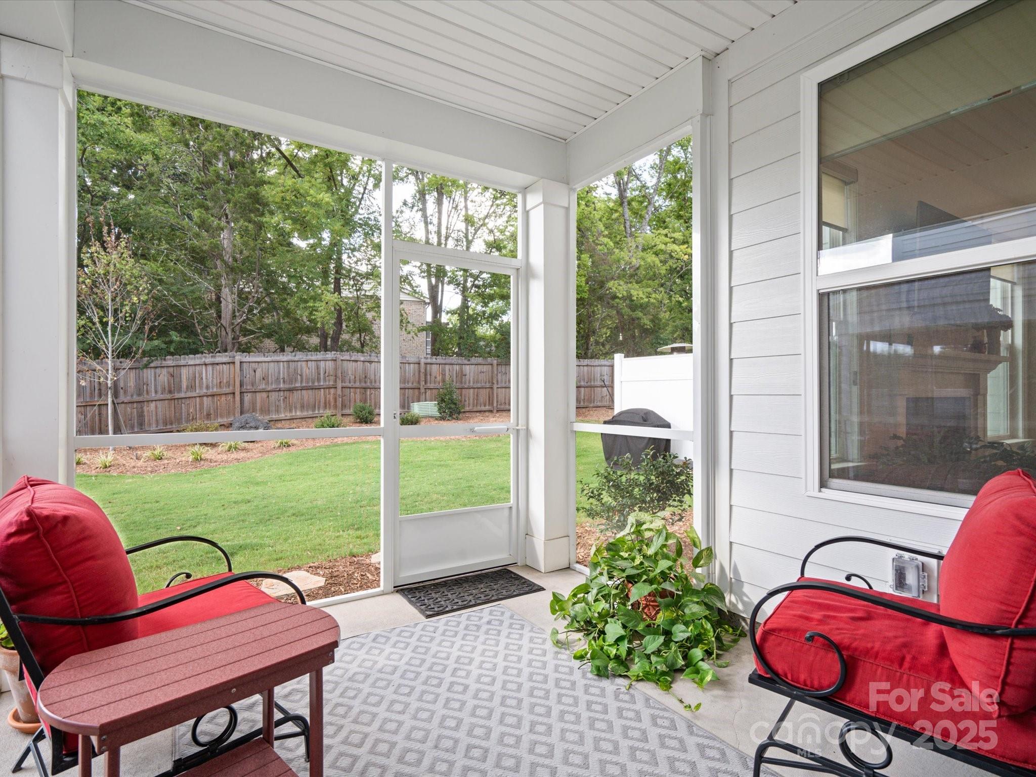 4013 Ashton Ridge Lane Charlotte, NC 28226 - Photo 31 of 36 a view of a chair and table in back yard