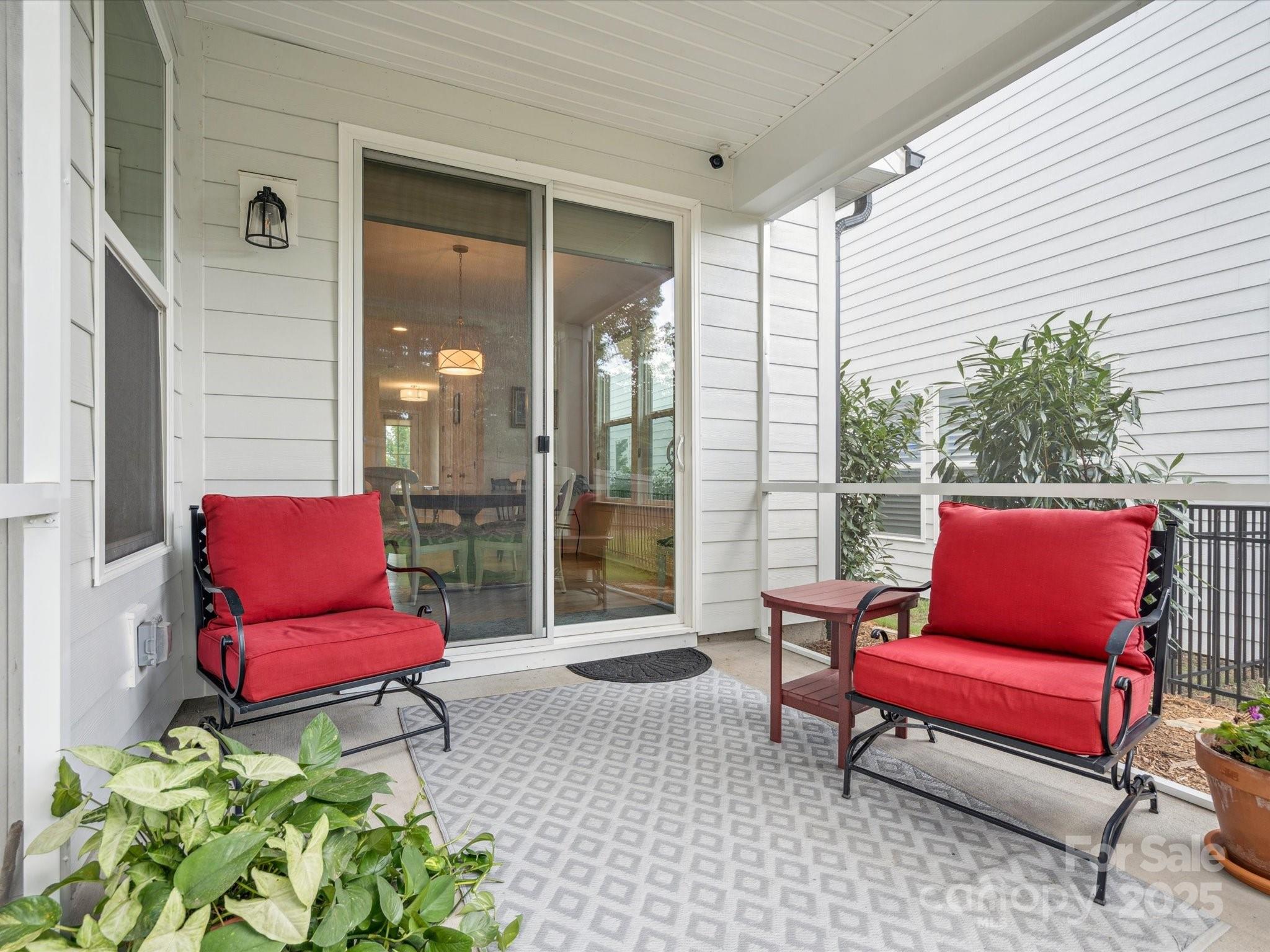 4013 Ashton Ridge Lane Charlotte, NC 28226 - Photo 32 of 36 a outdoor living space with furniture and a potted plant
