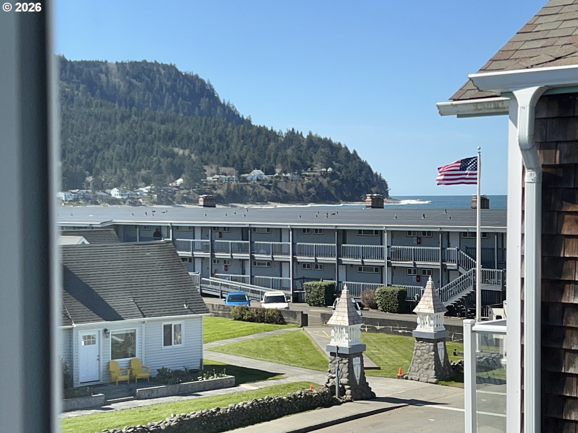 40 Avenue U, Unit 63 Seaside, OR 97138 - Photo 12 of 45 a view of roof deck with chair and tables