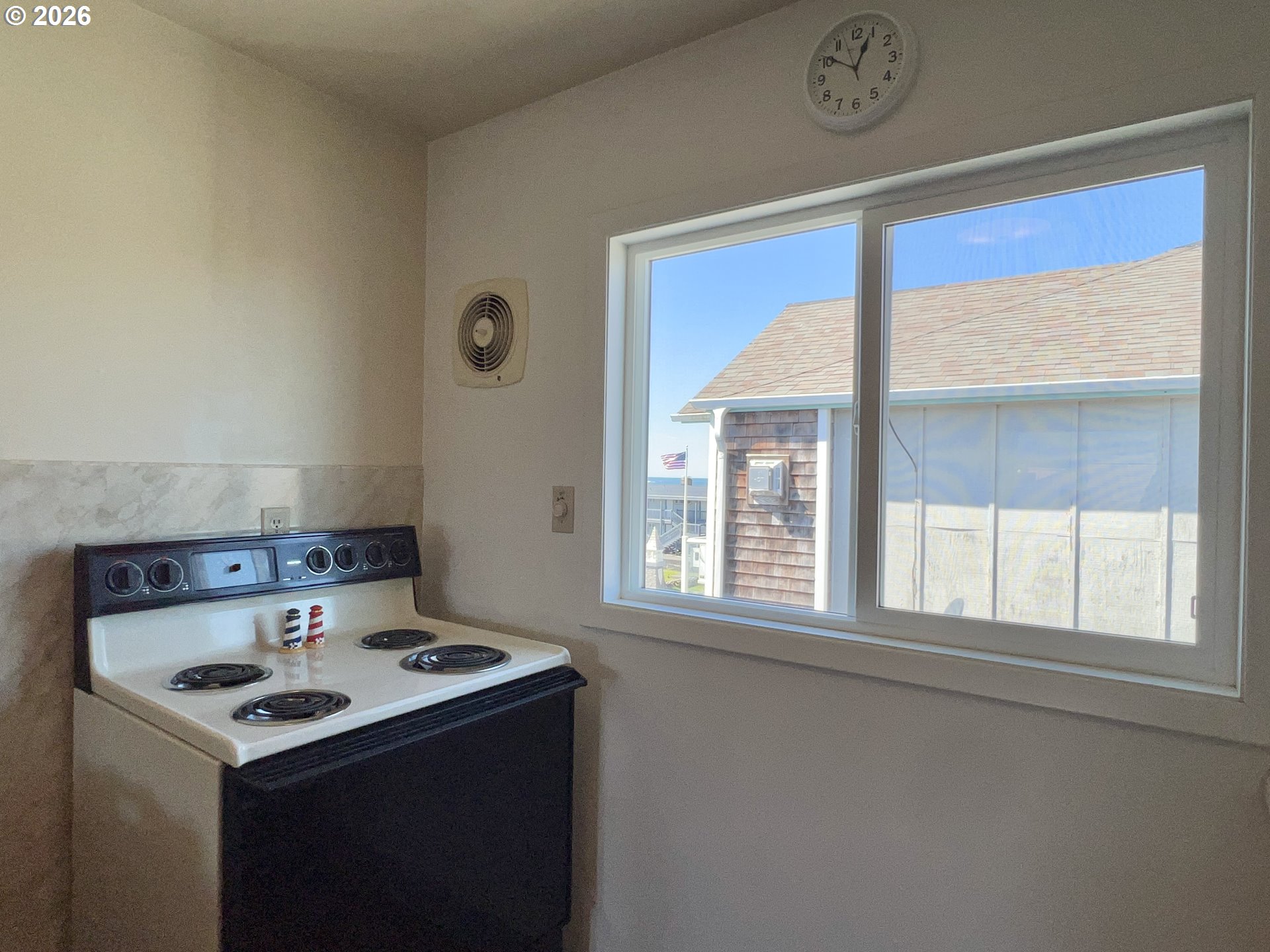 40 Avenue U, Unit 63 Seaside, OR 97138 - Photo 16 of 45 a view of kitchen sink stove and refrigerator