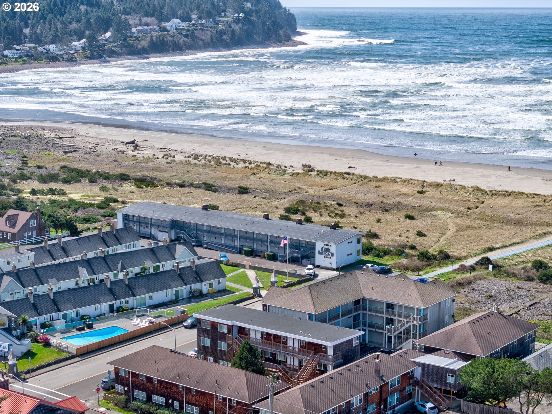 40 Avenue U, Unit 63 Seaside, OR 97138 - Photo 2 of 45 a view of a city with an ocean