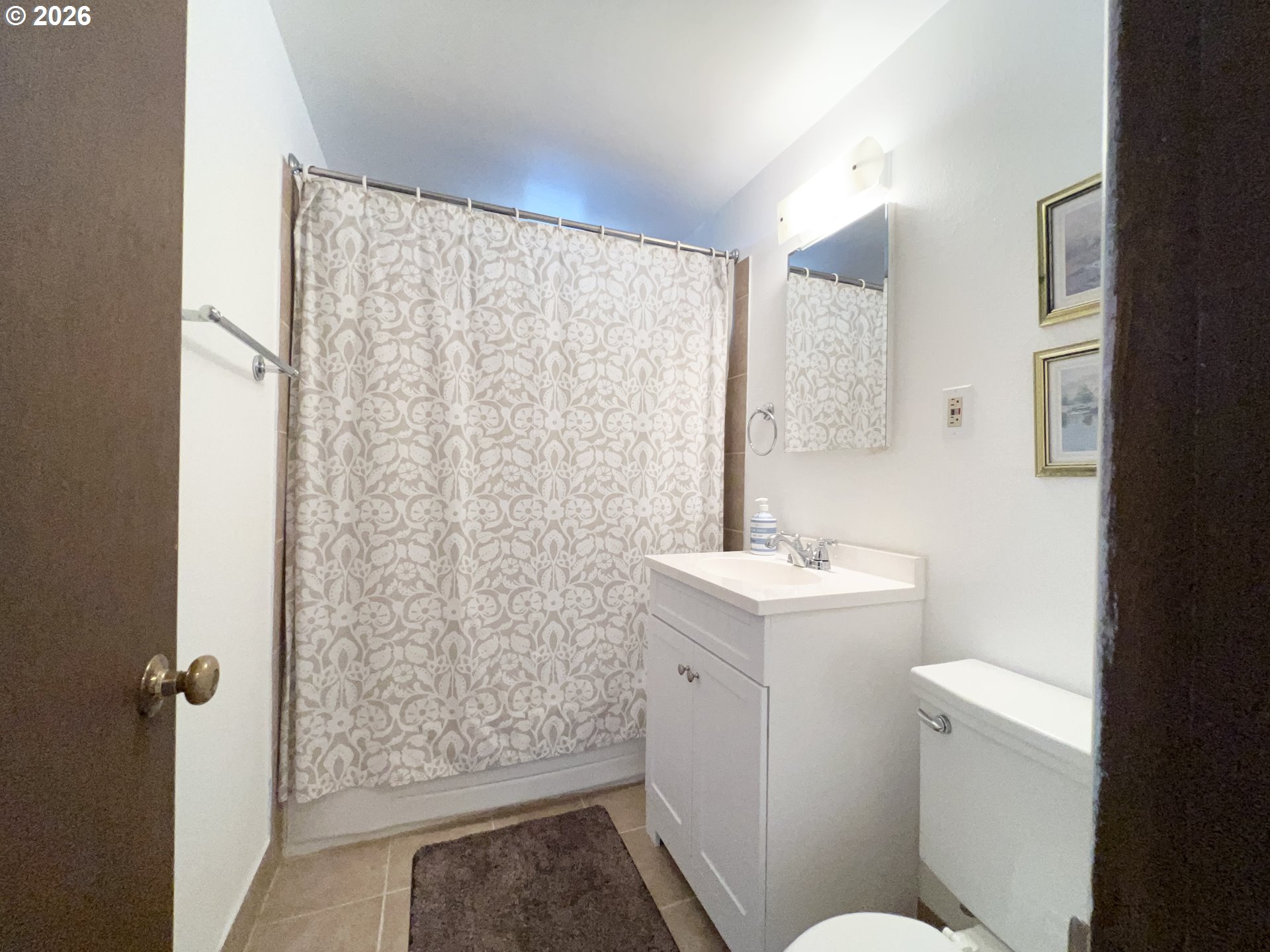 40 Avenue U, Unit 63 Seaside, OR 97138 - Photo 26 of 45 a bathroom with a sink toilet and shower